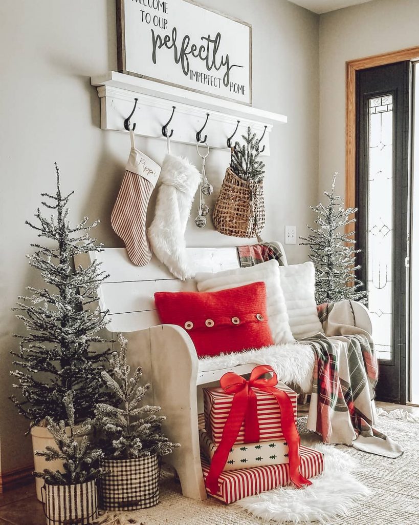 holiday entryway with christmas trees