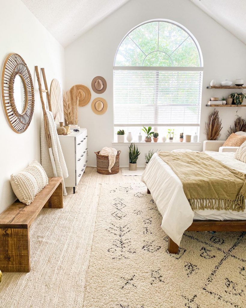 neutral layered rugs in bedroom