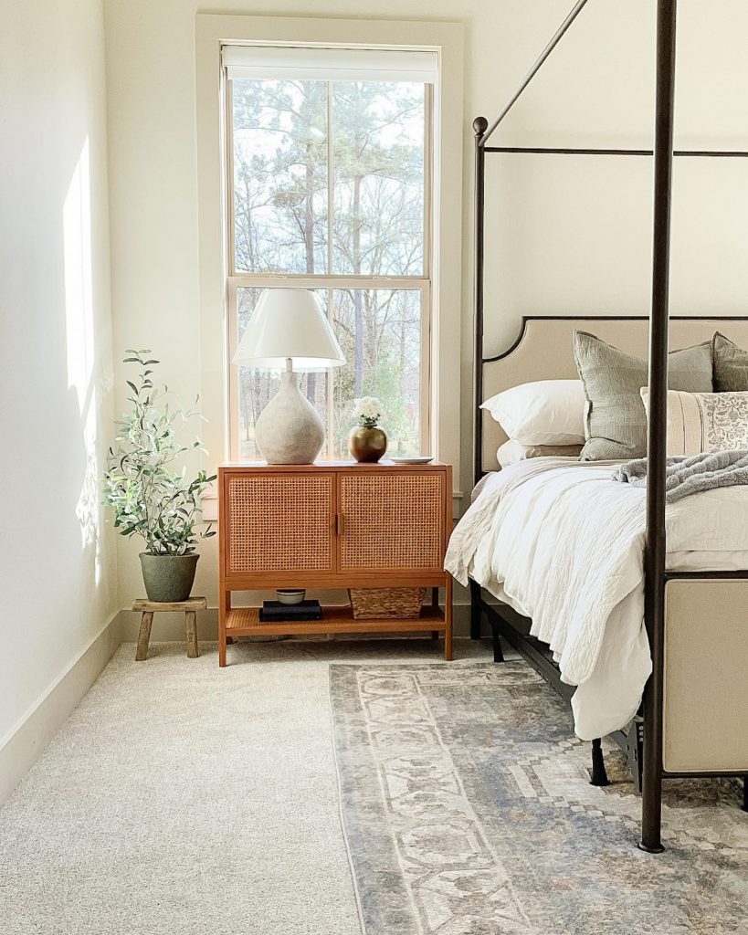 Frame your beautiful bed with an Oriental rug in hues that complement your bedding and wall colors.