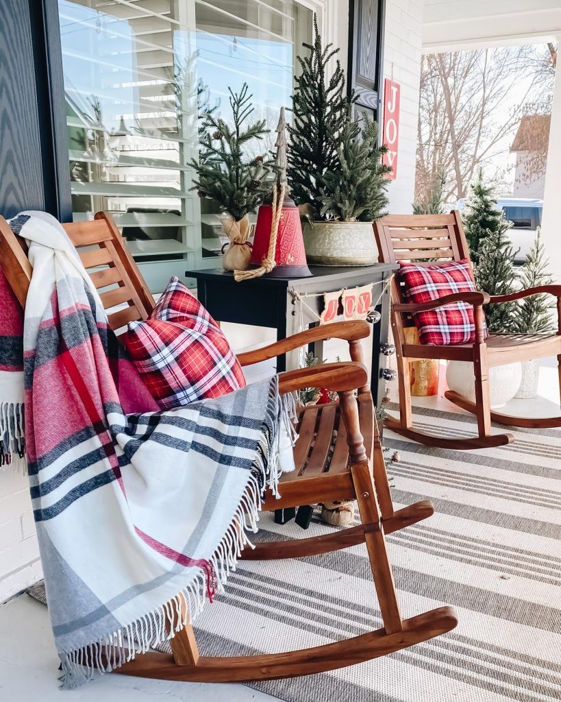 Remember to deck the porch and patio this Christmas with warming outdoor rugs. 
