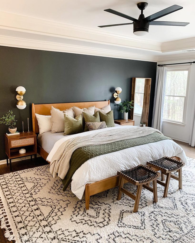 Pairing a black-and-white rug with another featured color is a helpful design secret. 