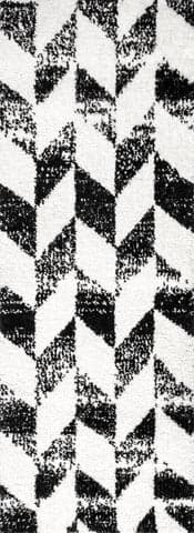 Isolated view of Black And White Runner Faded Herringbone Shag Rug, showcasing its design