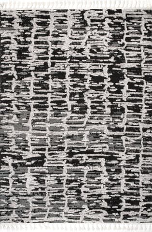 Isolated view of Light Grey Rectangle Textured Abstract Tasseled Rug, showcasing its design