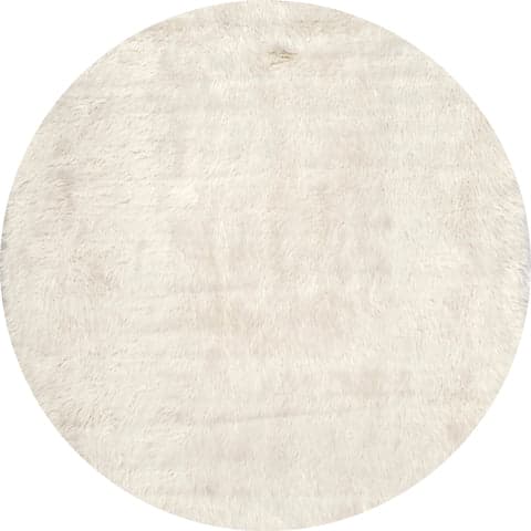 Isolated view of Ivory Round Hermione Shag Rug, showcasing its design