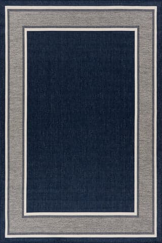 Isolated view of Navy Rectangle Aeli Modern Bordered Indoor/Outdoor Rug, showcasing its design