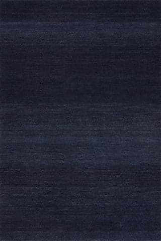 Isolated view of Navy Blue Rectangle Hollis Solid Wool Rug by Nate Berkus, showcasing its design