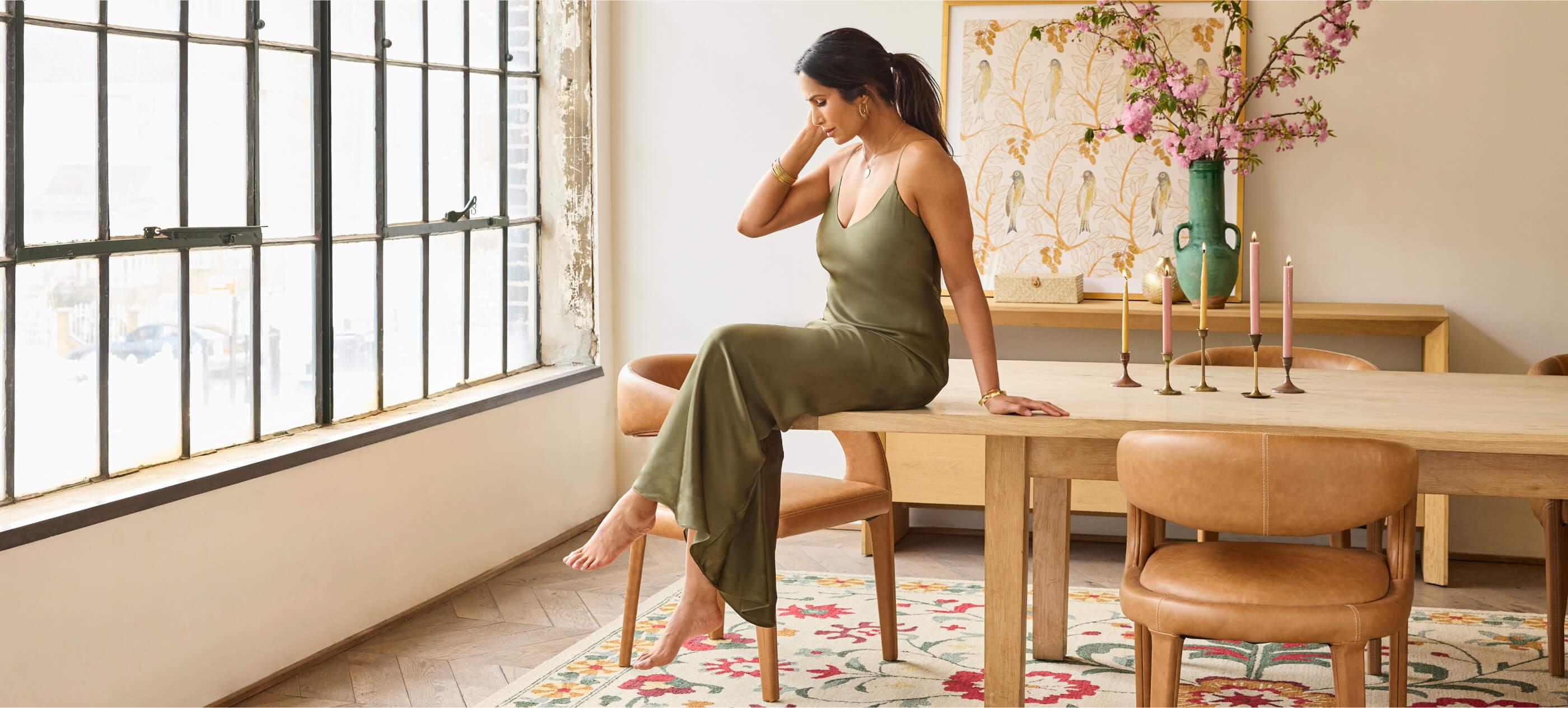 Padma Sitting On Dining Table