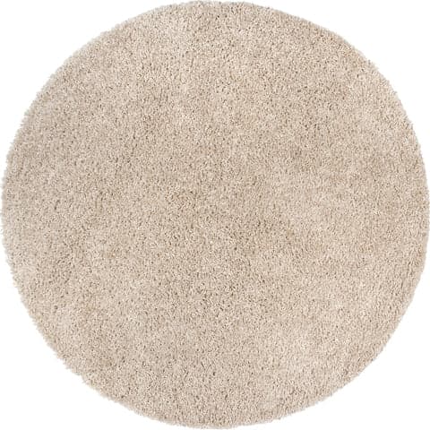 Isolated view of Beige Round Sade Solid Shag Rug, showcasing its design