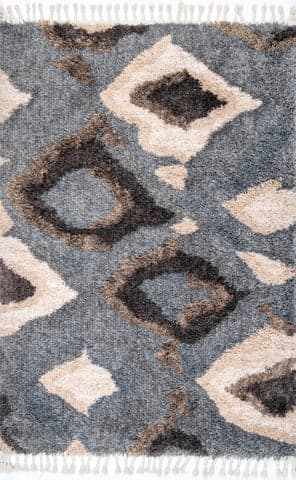 Isolated view of Grey Rectangle Abstract Iris Shag with Tassel Rug, showcasing its design