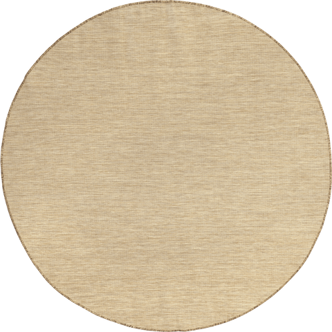 Isolated view of Brown Round Dorinda Hazy Solid Indoor/Outdoor Rug, showcasing its design