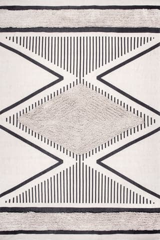 Isolated view of Beige Rectangle Cotton Shag Rug, showcasing its design