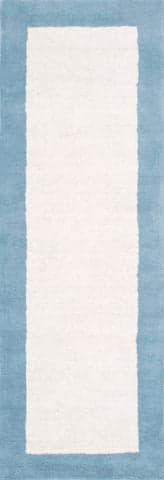 Isolated view of Baby Blue Runner Solid Border Rug, showcasing its design